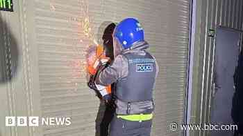 Police cut into 'chop shop' and find stolen BMW