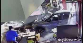 Video captures car crashing through B.C. Fatburger restaurant
