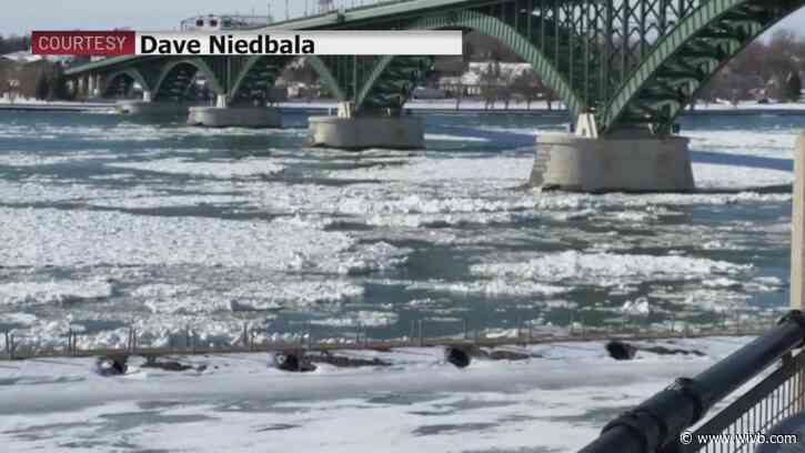 Ice sheets flow over Buffalo's ice boom into Niagara River