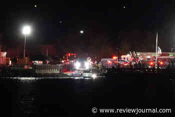 Passenger jet collides with helicopter at Reagan airport in Washington, FAA says