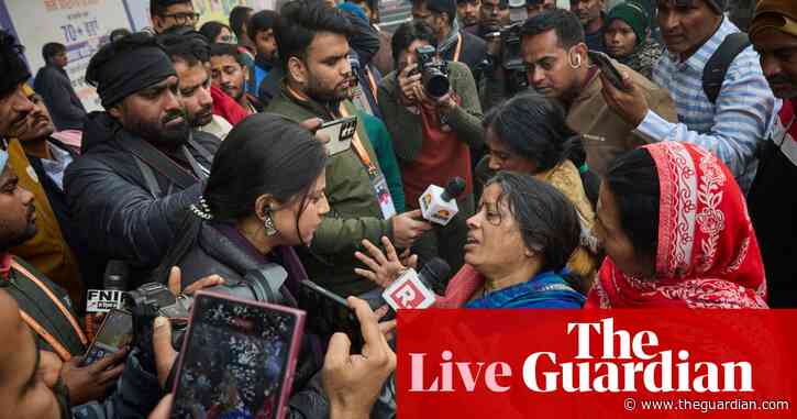 Police in India confirm at least 30 killed and 60 more people injured in crush – as it happened