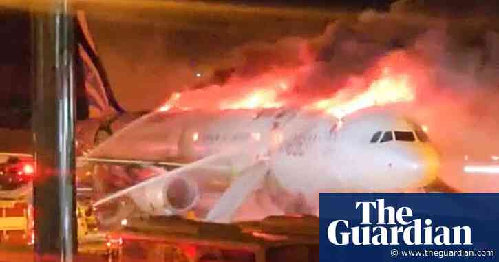 Passengers and crew evacuated as plane catches fire on South Korean runway