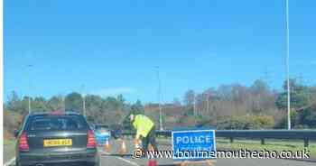 Road blocked following three-vehicle crash