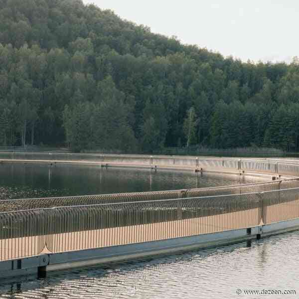 BuroLandschap snakes cycle bridge over lake on former Belgian coal mine