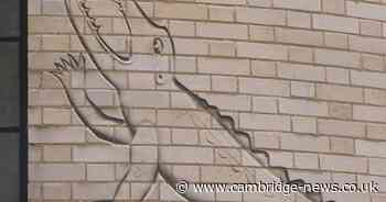 The curious crocodile carving on a city centre building linked to Soviet history