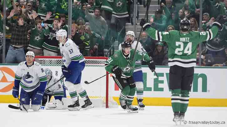 Hintz and Robertson lead Stars past Canucks 5-3 for 4th straight win