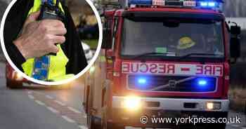 Fire service cuts man from vehicle in East Yorkshire village crash