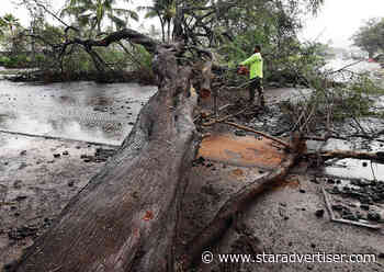 Crews clean up debris after storm ravages Hawaiian islands