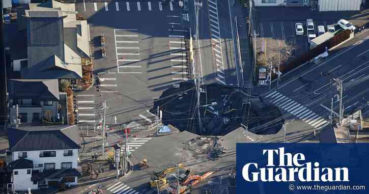 Fears grow in Japan for truck driver trapped in sinkhole for third day