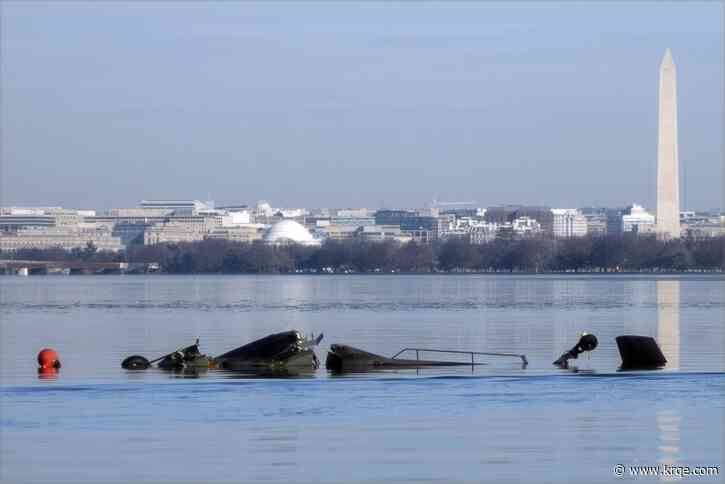 Recovery crews return to the Potomac debris after the deadly plane and helicopter crash
