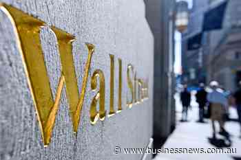 Wall St ends lower as Trump to implement tariffs