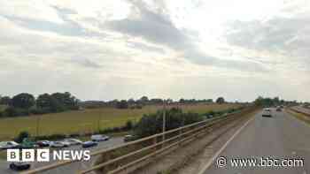 Major road closed by police after collision