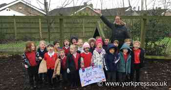 Reception pupils play part in songbird survival during winter
