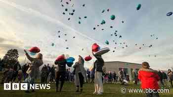Balloons released in memory of murdered teenagers