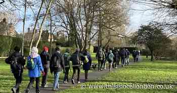 Walking group braves storm to mark milestone of 500th all-day trek
