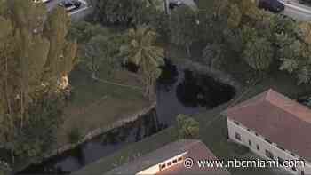 Police investigating after body found floating in canal in Coral Springs