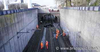 Major train line reopens after BMW plunges 20ft onto tracks