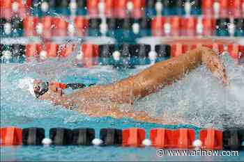 Arlington boys record top finishes in district swim & dive meet