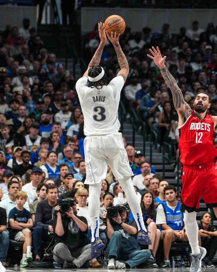 Davis super in debut as Mavs beat Rockets, 116-105