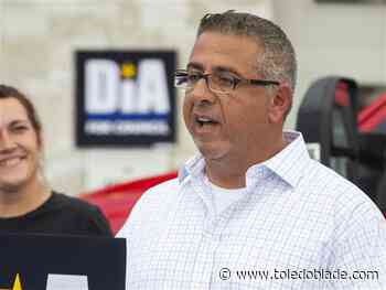 Father of slain police officer charged with charity fraud