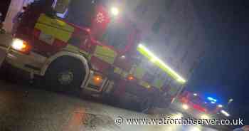 Flats fire sparks evacuation 'chaos' as man taken to hospital