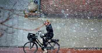 Mix van regen, natte sneeuw en sneeuw in Landsmeer in de avond