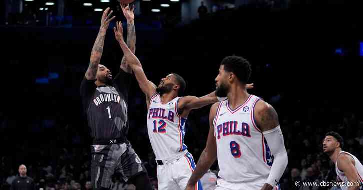 Russell scores 22 points as Nets beat 76ers 100-96