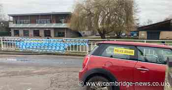 Man arrested after car crashes into River Cam
