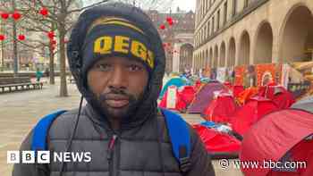 Safe from war but freezing in tents on city street