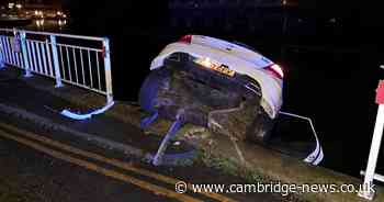 Riverside barrier damaged by crash that left car dangling into water