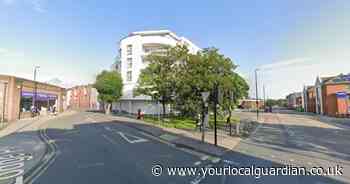 Arrest after man climbs on top of tall crane in Sutton