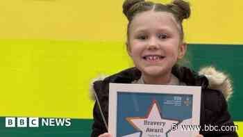 Girl, 7, who helped save mum gets award