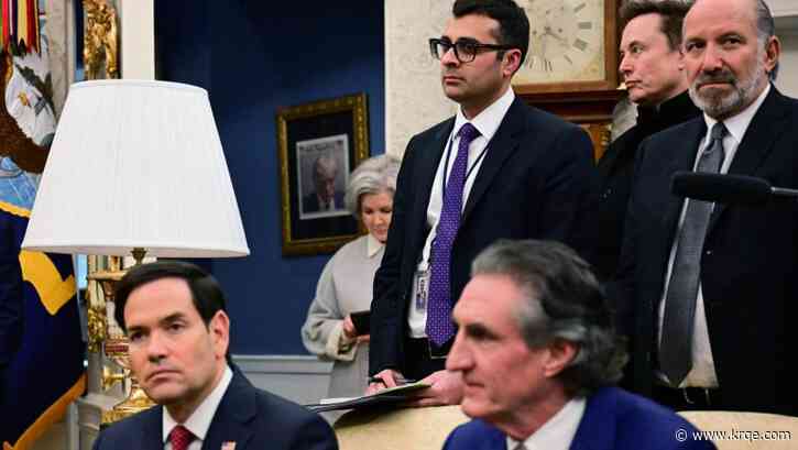 Trump's framed mug shot hangs outside Oval Office