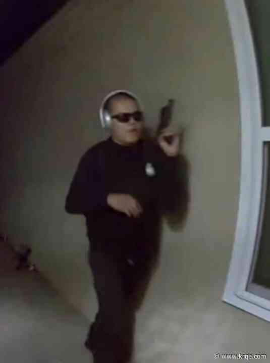 Albuquerque police searching for man seen on video knocking on doors while holding a gun