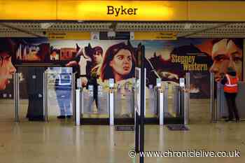 Byker Metro station mural depicting local area as classic western film poster is unveiled