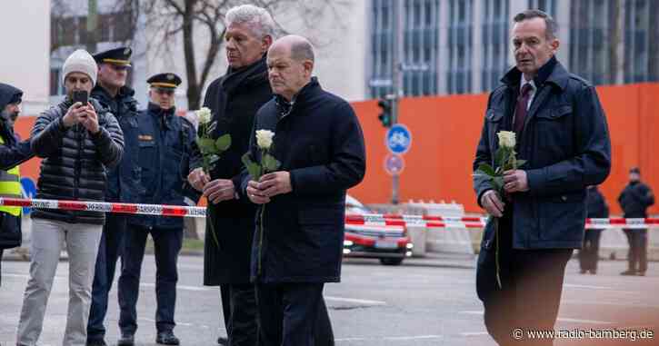 Scholz ruft in München zum Zusammenhalt auf