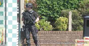 Man with knife 'made threats' in street as armed police called