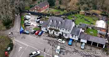 Manhunt enters second day after woman shot dead outside Kent pub