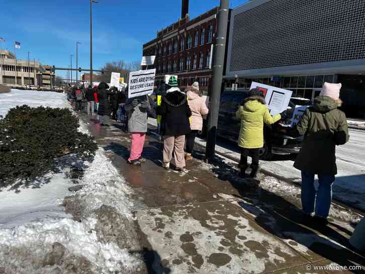 Protesters brave freezing temperatures outside Allen County Courthouse