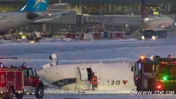 Passenger who dangled upside down after Toronto plane crash says he's lucky to be alive