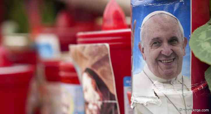 The pope has pneumonia in both lungs but remains in good spirits, Vatican says