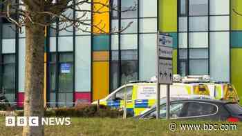 Woman hit by car outside hospital seriously injured