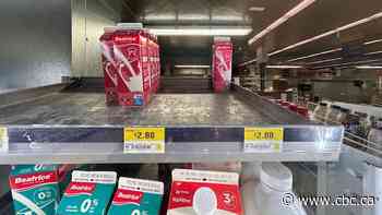 Walmart slapped higher prices on 1L milk cartons than permitted by Manitoba law