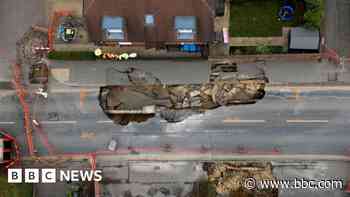 What is a sinkhole and how are they formed?