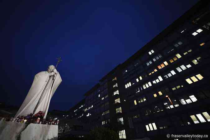 Vatican says Pope Francis is ‘improving slightly’ and working from the hospital