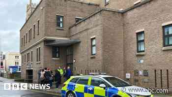 Hall evacuated after suspected grenades handed in