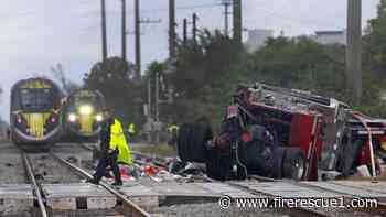 Fla. FF driving fire truck struck by train cited for failure to use 'due care'