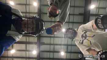 Small sticks, big talk at Sask. mini hockey stick tournament