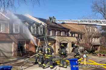 Firefighters battle townhouse fire in Arlington Ridge