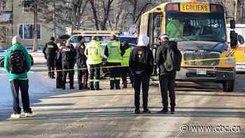 School bus, police vehicle collide in St. Boniface